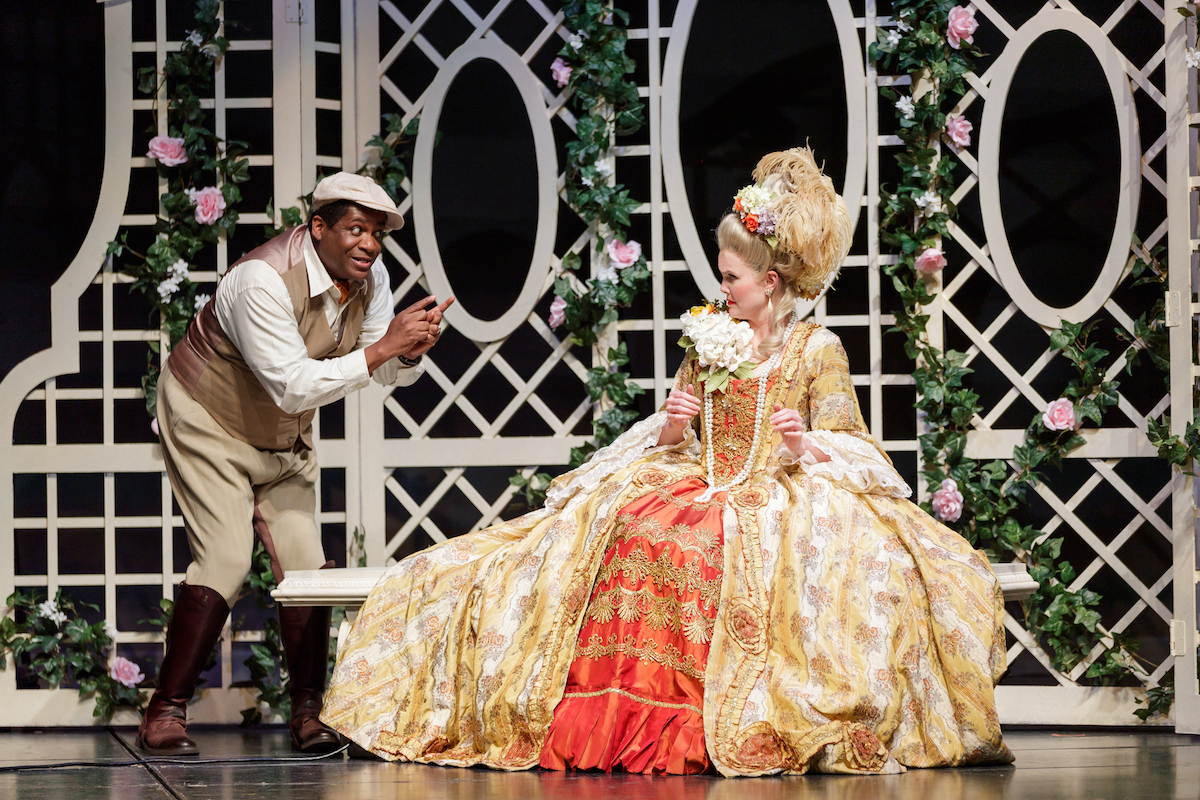 Ty Willis as Roscoe Dexter and Jessica Skerritt as Lina Lamont in Singin' in the Rain. Photo by Mark Kitaoka. 